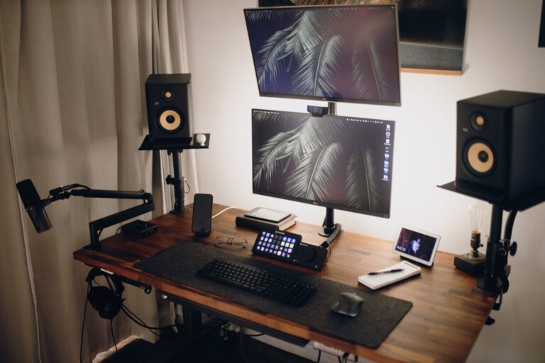 Monitor Arm vs Fixed Stand: Which Setup Maximizes Productivity - deskgearreviews